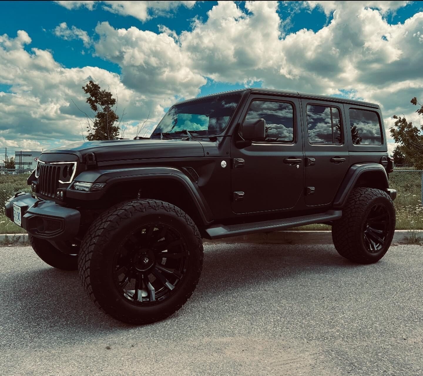 satin black 3m car wrapping on lifted jeep.