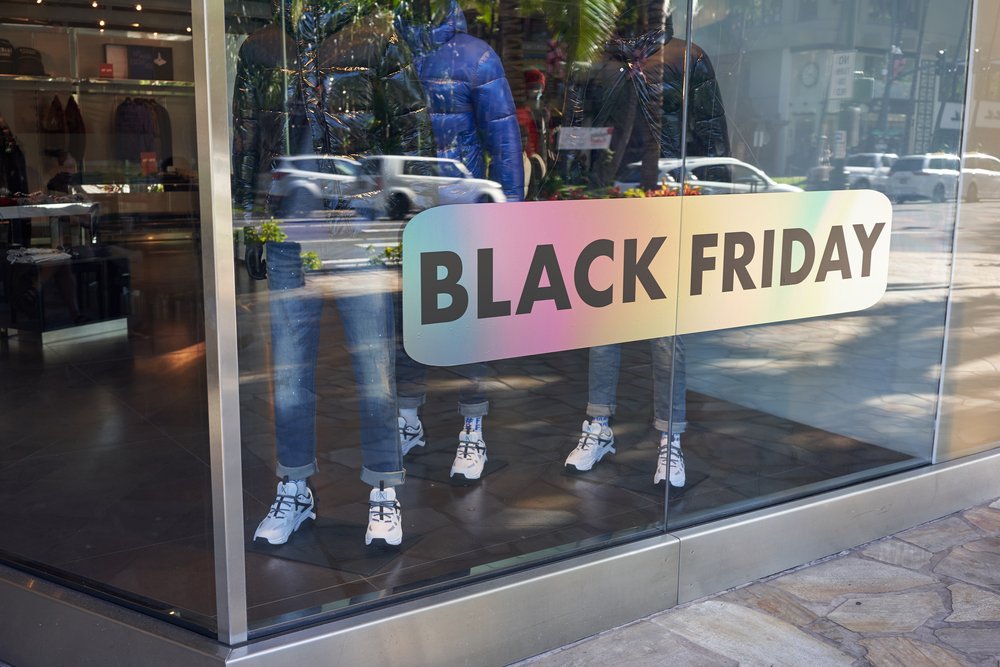 multi coloured black Friday window decals on glass.